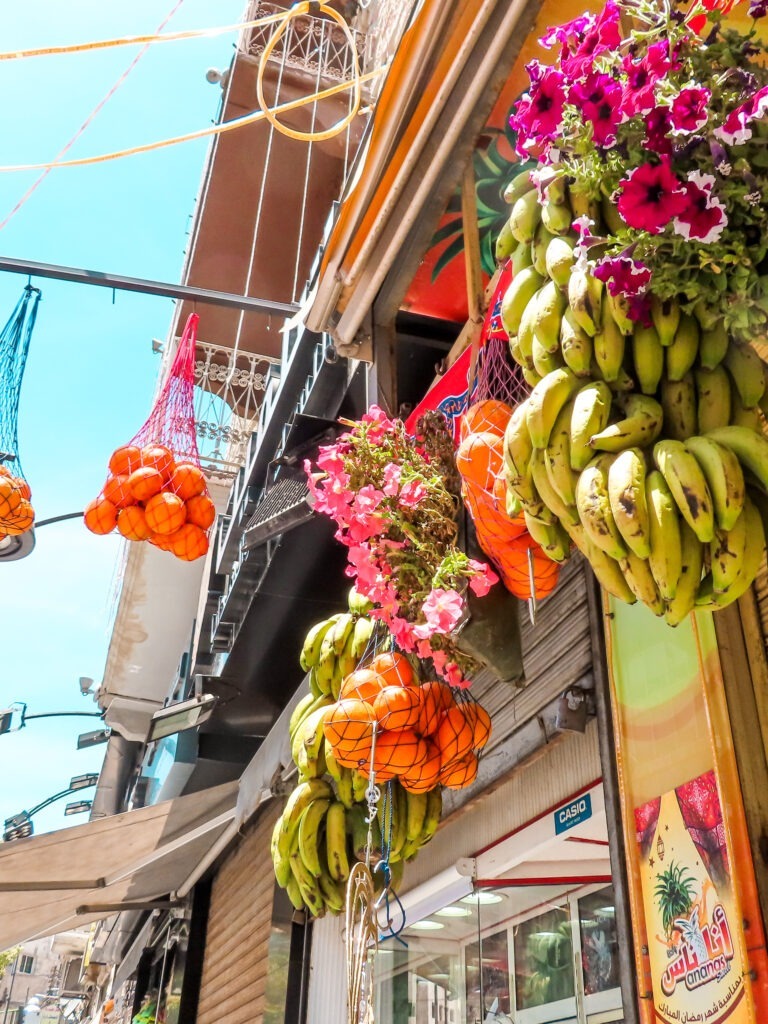 Fruit hanging from one of Amman's countless shops.