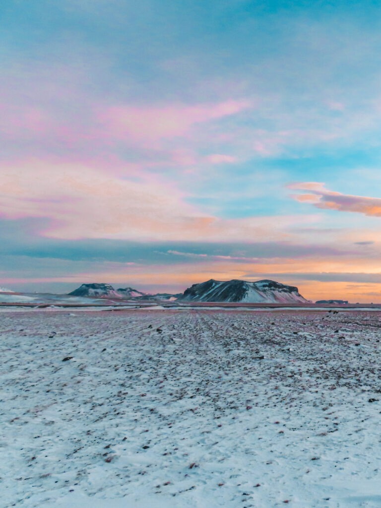 Sunset over a wintery landscape in Iceland