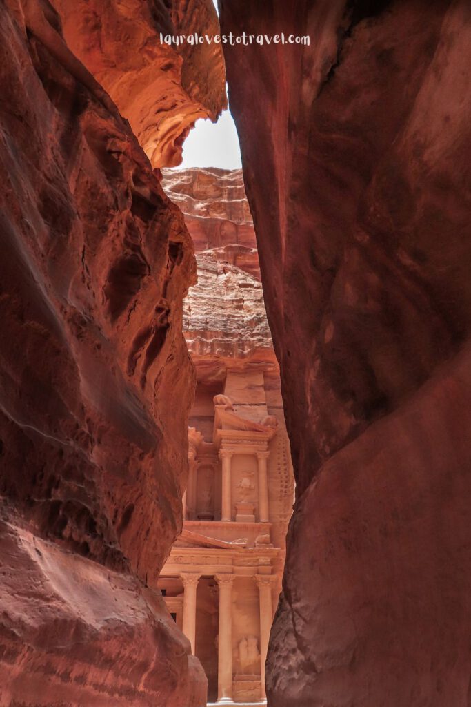 View from the narrow Siq on the Treasury in Petra, Jordan