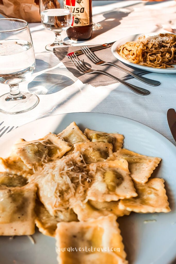 Two full plates of delicious pasta in a small town restaurant near Lago Bracciano