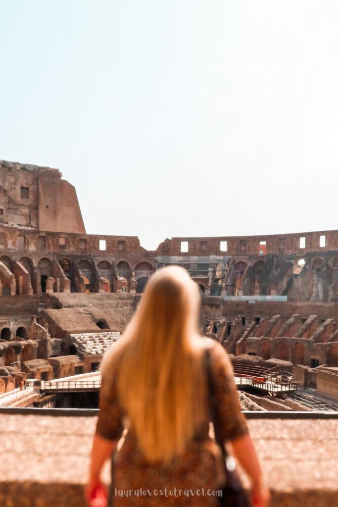 Exploring the ruins inside the Colosseum, Rome, Italy