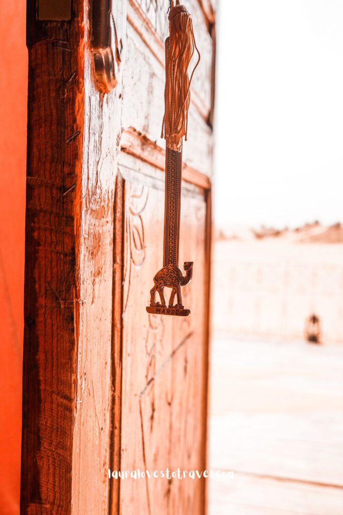 Key inside the door of an accommodation in the Sahara desert